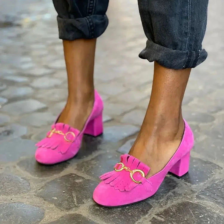 DÉCOLLETÉ CON DETTAGLIO FRANGIA E FIBBIA ORO